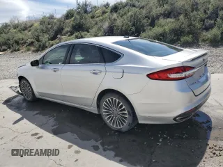 2018 Ford Fusion Titanium z VIN 3FA6P0D96JR155318, wystawiony jako Copart lot #53740505 z przebiegiem 86 567 mil mil oraz Szkoda całkowita • Salvage title. Historia ofert i sprzedaży dostępna na DreamBid. Obrazek 2.