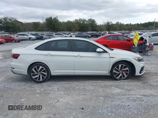 2020 Volkswagen Jetta GLI S with VIN 3VW6T7BU8LM058477, listed as a IAAI auction lot 41504769 with 121,419 mi miles and . Bid and sale history available at DreamBid. Image 13.