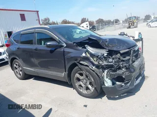 2019 Honda CR-V EX with VIN 5J6RW1H5XKA044056, listed as a IAAI auction lot 41856217 with 92,552 mi miles. Bid and sale history available at carsss.com. Image 14.