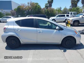 2014 Toyota Prius One with VIN JTDKDTB38E1061202, listed as a IAAI auction lot 42044747 with 133,409 mi miles and . Bid and sale history available at DreamBid. Image 13.