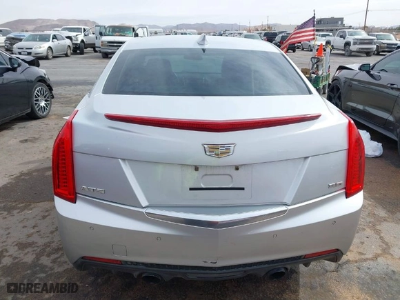 2015 Cadillac ATS Luxury with VIN 1G6AB5R35F0117304, listed as a IAAI auction lot 41523433 with 126,805 mi miles. Bid and sale history available at carsss.com. Image 16.