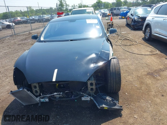2013 Tesla Model S Performance with VIN 5YJSA1CP5DFP25346, listed as a IAAI auction lot 42463047 with 112,909 mi miles and . Bid and sale history available at DreamBid. Image 13.