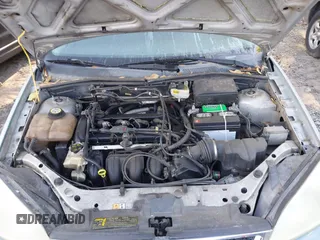 2007 Ford Focus S with VIN 1FAFP34N97W323618, listed as a IAAI auction lot 42003664 with 229,254 mi miles and . Bid and sale history available at carsss.com. Image 9.