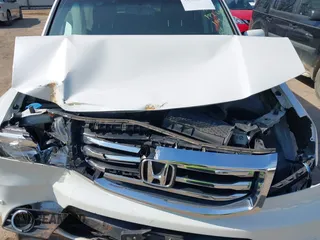 2013 Honda Pilot Touring with VIN 5FNYF3H92DB034731, listed as a IAAI auction lot 42049853 with 127,278 mi miles and . Bid and sale history available at DreamBid. Image 10.