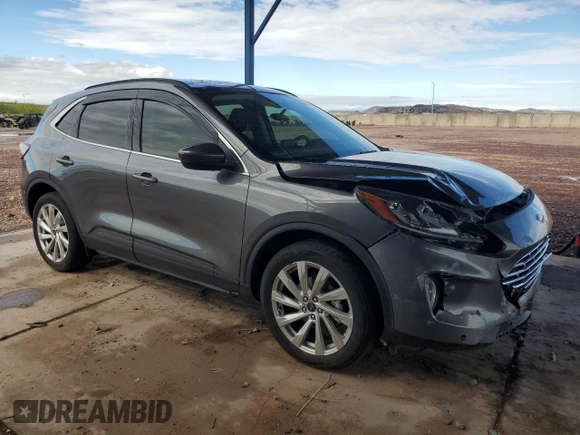 2021 Ford Escape Titanium with VIN 1FMCU9J92MUA08792, listed as a Copart auction lot 59270215 with 29,194 mi miles and Salvage title. Bid and sale history available at DreamBid. Image 4.