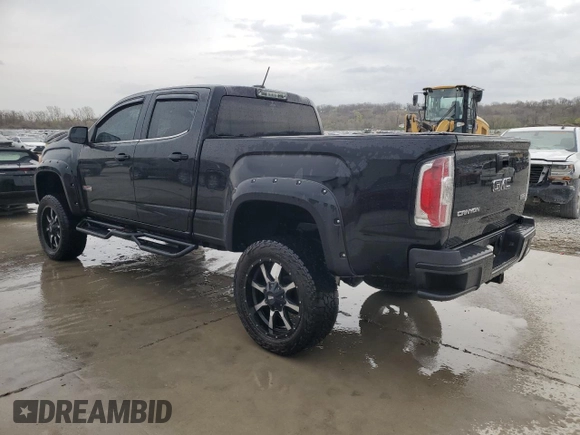 2015 GMC Canyon 4WD SLE with VIN 1GTG6BE30F1185696, listed as a Copart auction lot 51091255 with 173,322 mi miles and Salvage Title. Bid and sale history available at carsss.com. Image 2.