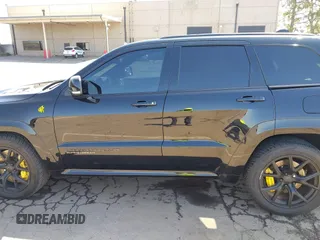 2020 Jeep Grand Cherokee Trackhawk with VIN 1C4RJFN96LC336561, listed as a IAAI auction lot 41991800 with 58,781 mi miles and . Bid and sale history available at DreamBid. Image 14.