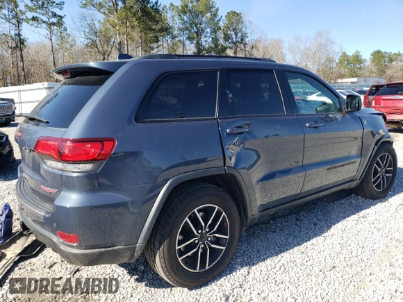 2021 Jeep Grand Cherokee Trailhawk with VIN 1C4RJFLG6MC590810, listed as a Copart auction lot 43708095 with 59,566 mi miles and Salvage Title. Bid and sale history available at carsss.com. Image 3.