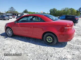 2013 Volkswagen Eos Komfort with VIN WVWBW8AH7DV000421, listed as a Copart auction lot 51988795 with 102,155 mi miles and Salvage Title. Bid and sale history available at DreamBid. Image 2.