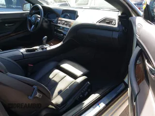 2018 BMW 6 Series 640i with VIN WBA6F1C5XJGT83781, listed as a IAAI auction lot 41945616 with 46,370 mi miles and . Bid and sale history available at carsss.com. Image 5.