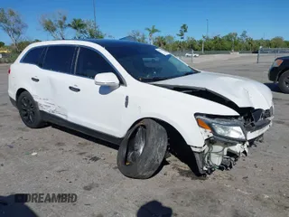 2013 Lincoln MKT EcoBoost with VIN 2LMHJ5AT9DBL58448, listed as a IAAI auction lot 41740348 with 254,166 mi miles. Bid and sale history available at carsss.com. Image 1.