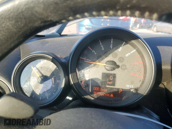 2015 MINI Convertible S with VIN WMWZP3C58F2A91317, listed as a Copart auction lot 42748905 with 164,932 mi miles and Salvage title. Bid and sale history available at DreamBid. Image 9.