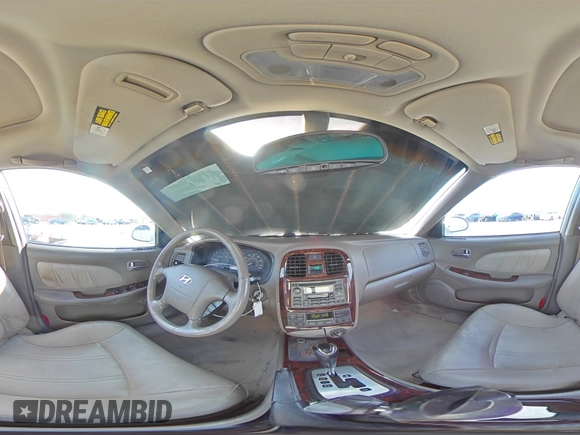 2004 Hyundai Sonata GLS with VIN KMHWF35H64A073703, listed as a Copart auction lot 74333504 with 105,034 mi miles and Salvage Title. Bid and sale history available at carsss.com. Image 13.