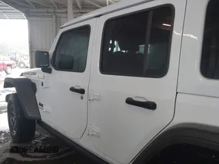 2024 Jeep Wrangler Rubicon with VIN 1C4PJXFG7RW334190, listed as a IAAI auction lot 42332948 with 14,272 mi miles and . Bid and sale history available at DreamBid. Image 14.