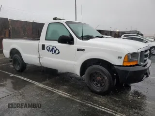 1999 Ford Super Duty F-250 XL with VIN 1FTNF20L6XEE74882, listed as a Copart auction lot 45205425 with 248,699 mi miles and Clean Title. Bid and sale history available at carsss.com. Image 4.
