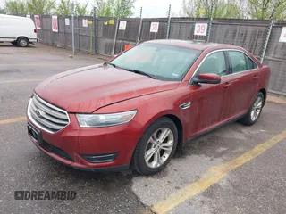 2014 Ford Taurus SEL with VIN 1FAHP2E86EG146478, listed as a IAAI auction lot 42131865 with 124,204 mi miles and . Bid and sale history available at DreamBid. Image 2.