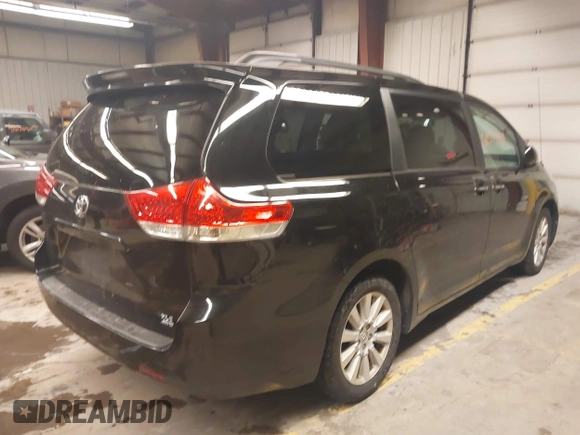 2013 Toyota Sienna XLE with VIN 5TDDK3DC0DS067993, listed as a IAAI auction lot 41597189 with 159,314 mi miles and . Bid and sale history available at DreamBid. Image 4.