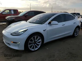 2018 Tesla Model 3 Long Range Battery with VIN 5YJ3E1EB9JF088757, listed as a Copart auction lot 74204424 with 123,160 mi miles and Non Repairable. Bid and sale history available at DreamBid. Image 1.