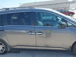 2012 Honda Odyssey EX-L with VIN 5FNRL5H69CB047425, listed as a IAAI auction lot 42064979 with 242,409 mi miles and . Bid and sale history available at carsss.com. Image 14.
