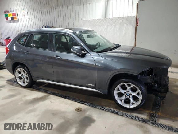 2015 BMW X1 xDrive28i with VIN WBAVL1C50FVY26284, listed as a Copart auction lot 49709155 with 120,138 mi miles and Salvage Title. Bid and sale history available at carsss.com. Image 4.