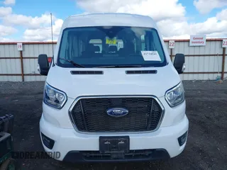 2023 Ford Transit Passenger XL with VIN 1FBAX2C82PKB28840, listed as a IAAI auction lot 41734942 with 20,504 mi miles and . Bid and sale history available at DreamBid. Image 12.
