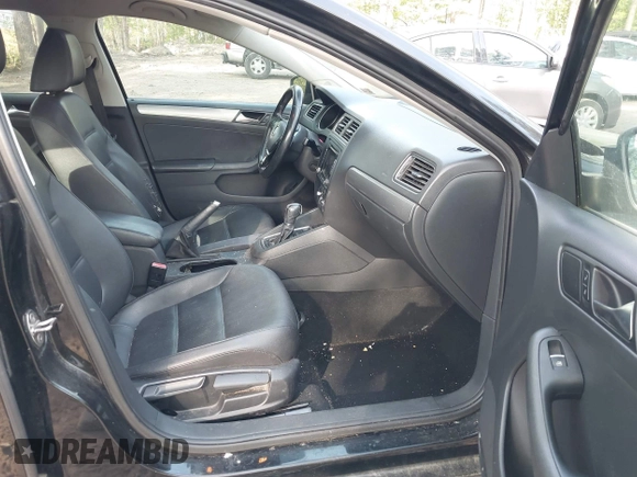 2015 Volkswagen Jetta SE z VIN 3VWD07AJ1FM277499, wystawiony jako IAAI lot #42085122 z przebiegiem 122 754 mil mil oraz . Historia ofert i sprzedaży dostępna na DreamBid. Obrazek 5.