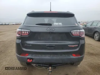 2018 Jeep Compass Trailhawk with VIN 3C4NJDDB6JT207289, listed as a Copart auction lot 56013675 with 83,385 mi miles and Salvage title. Bid and sale history available at DreamBid. Image 6.