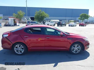 2012 Kia Optima LX z VIN 5XXGM4A78CG056373, wystawiony jako IAAI lot #42263150 z przebiegiem 81 905 mil mil oraz . Historia ofert i sprzedaży dostępna na DreamBid. Obrazek 14.