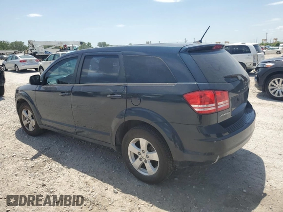 2013 Dodge Journey American Value with VIN 3C4PDCAB1DT650629, listed as a Copart auction lot 62072965 with 87,674 mi miles and Salvage title. Bid and sale history available at DreamBid. Image 2.