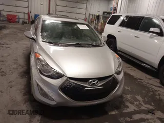 2013 Hyundai Elantra Coupe SE with VIN KMHDH6AEXDU022783, listed as a IAAI auction lot 41595832 with 153,330 mi miles. Bid and sale history available at carsss.com. Image 6.