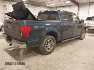 2018 Ford F-150 XL with VIN 1FTEW1EP4JFA00923, listed as a IAAI auction lot 41506293 with 153,523 mi miles and . Bid and sale history available at DreamBid. Image 4.