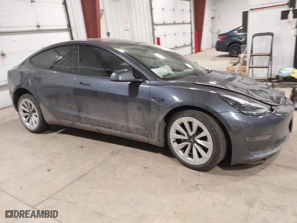 2022 Tesla Model 3 Long Range with VIN 5YJ3E1EB5NF155330, listed as a IAAI auction lot 41713521 with NaN miles. Bid and sale history available at carsss.com. Image 1.