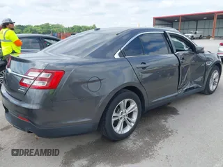 2015 Ford Taurus SEL with VIN 1FAHP2E83FG175051, listed as a IAAI auction lot 42357517 with 200,033 mi miles and . Bid and sale history available at DreamBid. Image 4.
