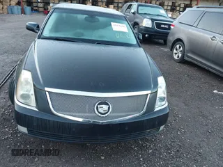 2008 Cadillac DTS 1SA z VIN 1G6KD57Y78U174757, wystawiony jako IAAI lot #41436686 z przebiegiem 158 945 mil mil oraz . Historia ofert i sprzedaży dostępna na DreamBid. Obrazek 6.