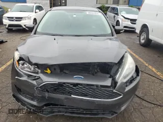 2016 Ford Focus SE with VIN 1FADP3F24GL312246, listed as a Copart auction lot 58564955 with 146,598 mi miles and Clean title. Bid and sale history available at DreamBid. Image 5.