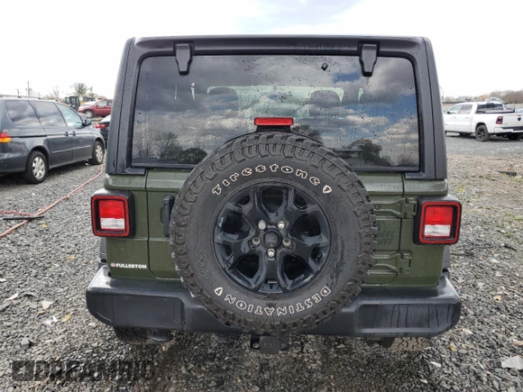 2021 Jeep Wrangler Sport z VIN 1C4GJXAN5MW668474, wystawiony jako Copart lot #53238095 z przebiegiem Nie podano mil oraz Szkody całkowita. Historia ofert i sprzedaży dostępna na DreamBid. Obrazek 6.