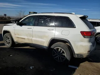 2021 Jeep Grand Cherokee Trailhawk with VIN 1C4RJFLG3MC646573, listed as a Copart auction lot 82687014 with 83,294 mi miles and Salvage Title. Bid and sale history available at carsss.com. Image 2.