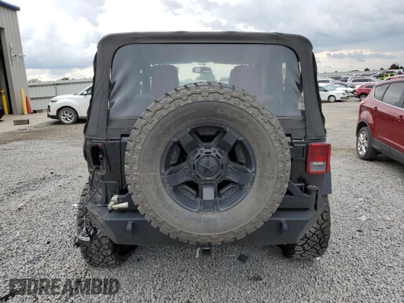 2014 Jeep Wrangler Sport with VIN 1C4AJWAG5EL326480, listed as a Copart auction lot 60653955 with 94,102 mi miles and Salvage title. Bid and sale history available at DreamBid. Image 6.