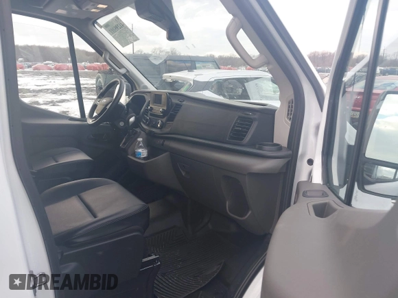 2023 Ford Transit Cargo with VIN 1FTBW1X83PKC09336, listed as a IAAI auction lot 41299101 with 10,551 mi miles and . Bid and sale history available at DreamBid. Image 5.