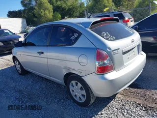 2007 Hyundai Accent GS with VIN KMHCM36C47U003261, listed as a IAAI auction lot 40883034 with 108,725 mi miles. Bid and sale history available at carsss.com. Image 3.