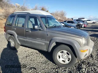 2003 Jeep Liberty Sport with VIN 1J4GL48K53W641210, listed as a Copart auction lot 44279145 with 215,498 mi miles and Clean Title. Bid and sale history available at carsss.com. Image 4.