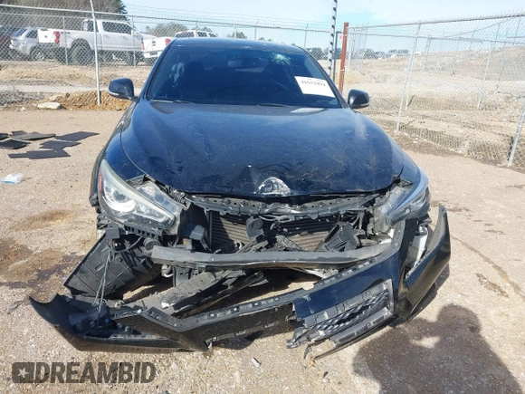 2015 Infiniti Q50 Premium z VIN JN1BV7AR5FM418350, wystawiony jako IAAI lot #41622894 z przebiegiem 135 478 mil mil oraz . Historia ofert i sprzedaży dostępna na DreamBid. Obrazek 6.