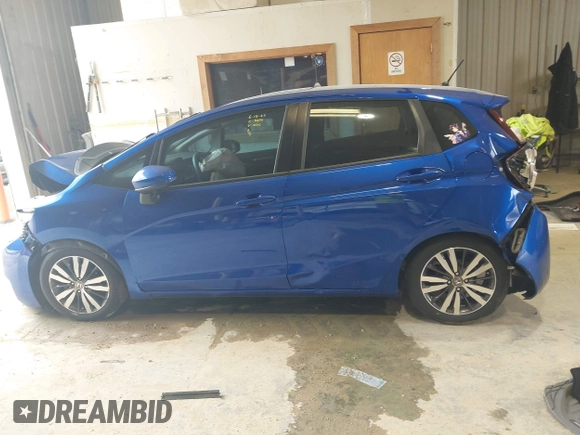2015 Honda Fit EX-L z VIN 3HGGK5H82FM754220, wystawiony jako IAAI lot #42570240 z przebiegiem Nie podano mil oraz . Historia ofert i sprzedaży dostępna na DreamBid. Obrazek 14.
