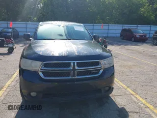 2012 Dodge Durango SXT z VIN 1C4RDJAGXCC207284, wystawiony jako IAAI lot #42379109 z przebiegiem 266 270 mil mil oraz . Historia ofert i sprzedaży dostępna na DreamBid. Obrazek 12.