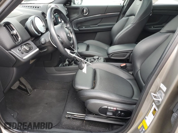 2018 MINI Countryman Cooper S E with VIN WMZYU7C47J3E56482, listed as a Copart auction lot 48877985 with 60,829 mi miles and Salvage Title. Bid and sale history available at carsss.com. Image 7.