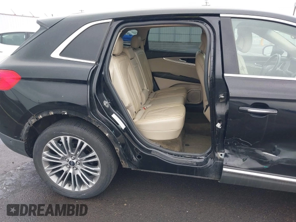 2017 Lincoln MKX Reserve with VIN 2LMPJ8LR7HBL30488, listed as a IAAI auction lot 42294191 with 64,246 mi miles and . Bid and sale history available at DreamBid. Image 6.
