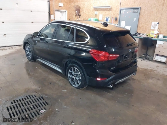 2020 BMW X1 xDrive28i with VIN WBXJG9C07L5P71792, listed as a IAAI auction lot 41583132 with 150,095 mi miles. Bid and sale history available at carsss.com. Image 3.