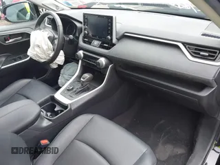 2021 Toyota RAV4 Hybrid LE with VIN 2T3B6RFV5MW022592, listed as a IAAI auction lot 42573098 with 25,651 mi miles and . Bid and sale history available at DreamBid. Image 5.