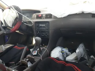 1999 Toyota Camry LE z VIN JT2BF28K5X0200853, wystawiony jako Copart lot #50666075 z przebiegiem Nie podano mil oraz Nie do naprawy • Non repairable. Historia ofert i sprzedaży dostępna na DreamBid. Obrazek 8.