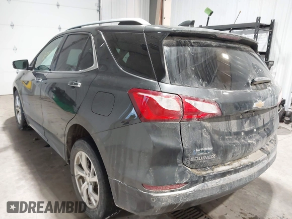 2019 Chevrolet Equinox Premier with VIN 2GNAXXEV2K6127055, listed as a IAAI auction lot 41598381 with 132,126 mi miles and . Bid and sale history available at DreamBid. Image 3.